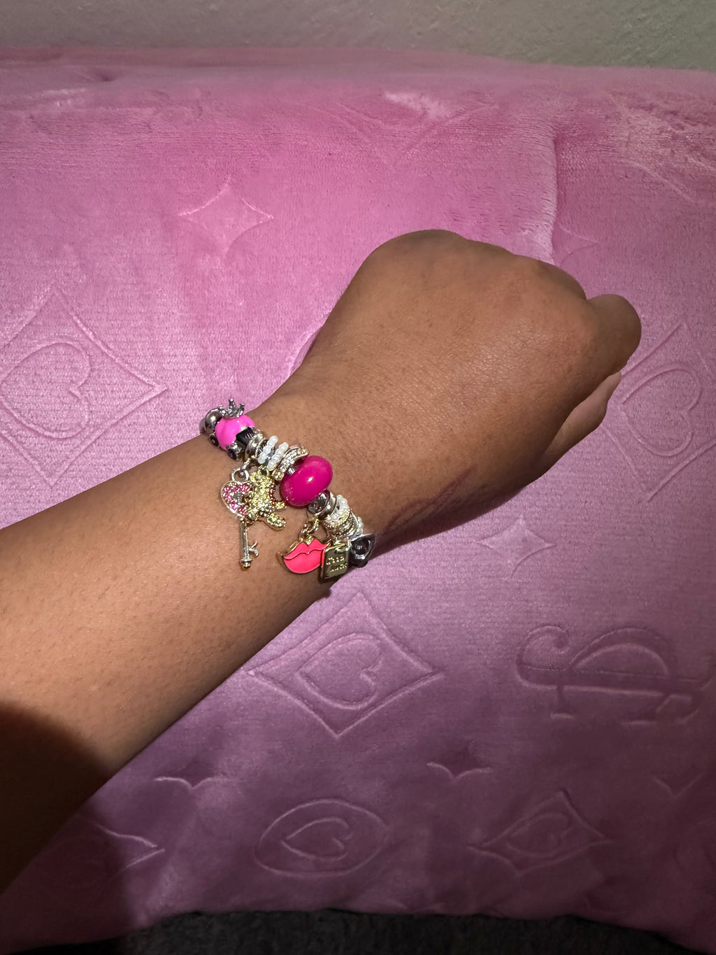 Pink charm bracelet